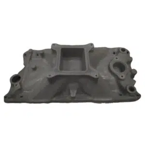 Gray automotive intake manifold, top view.