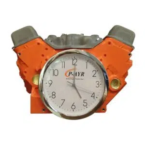 Wall clock mounted in orange engine block