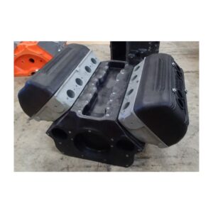 V8 engine block on workshop floor