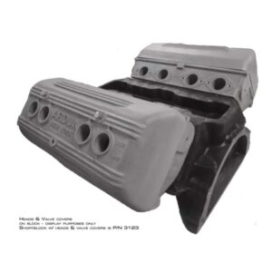 Engine block with valve covers on display.