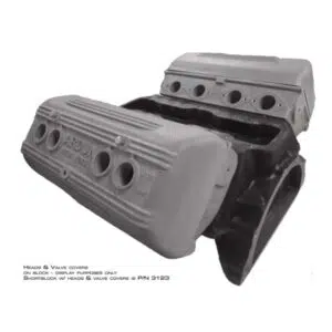 Engine block with valve covers on display.