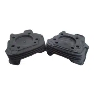 Stacked black automotive engine gasket parts