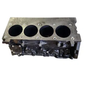 Automotive engine block with four cylinders visible.